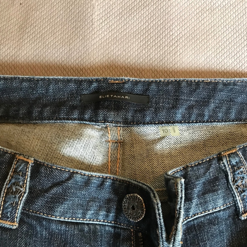 Elie Tahari boot-cut jeans.